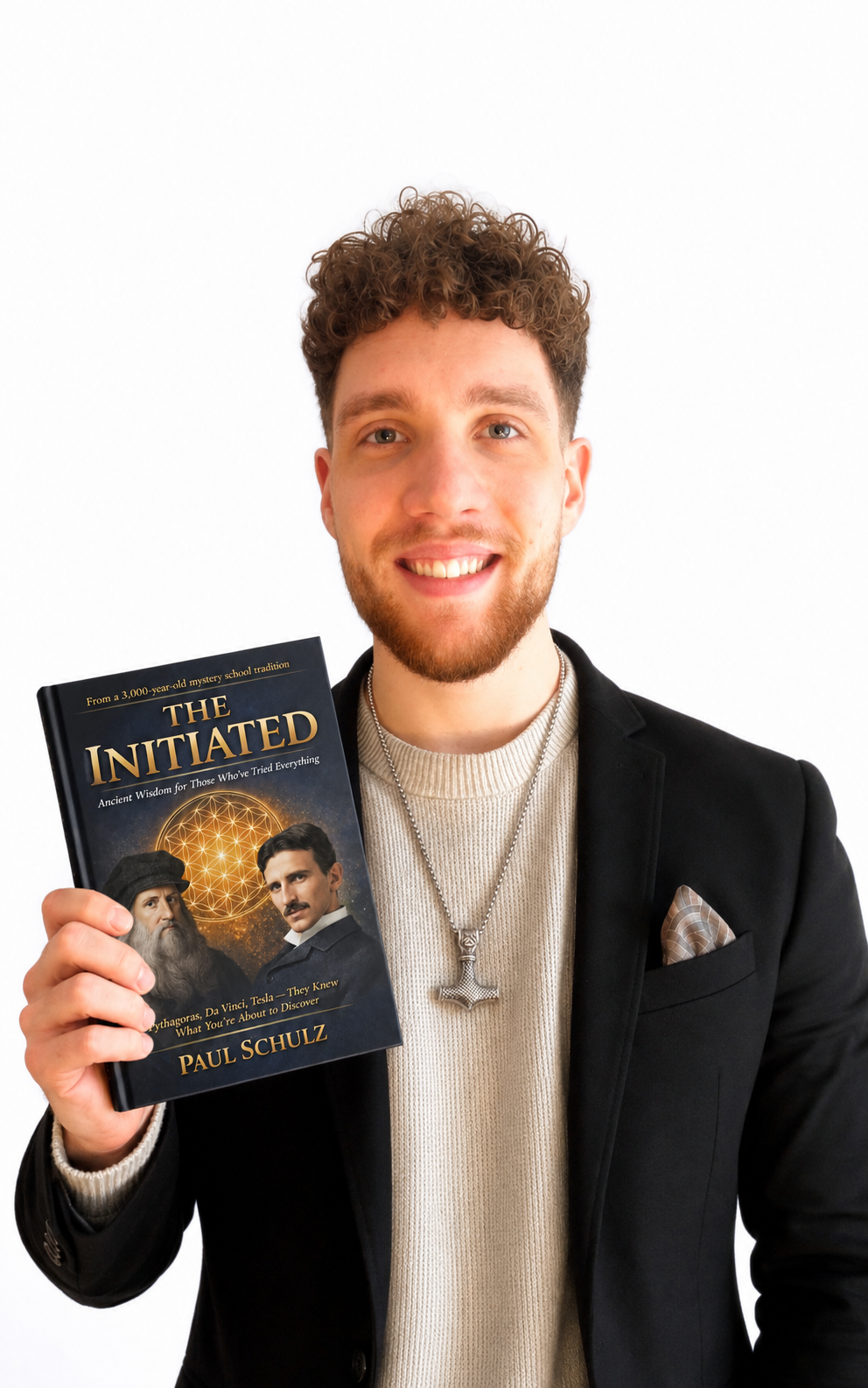 Paul Schulz, Ritual Master, 2nd Step, holding his book The Initiated